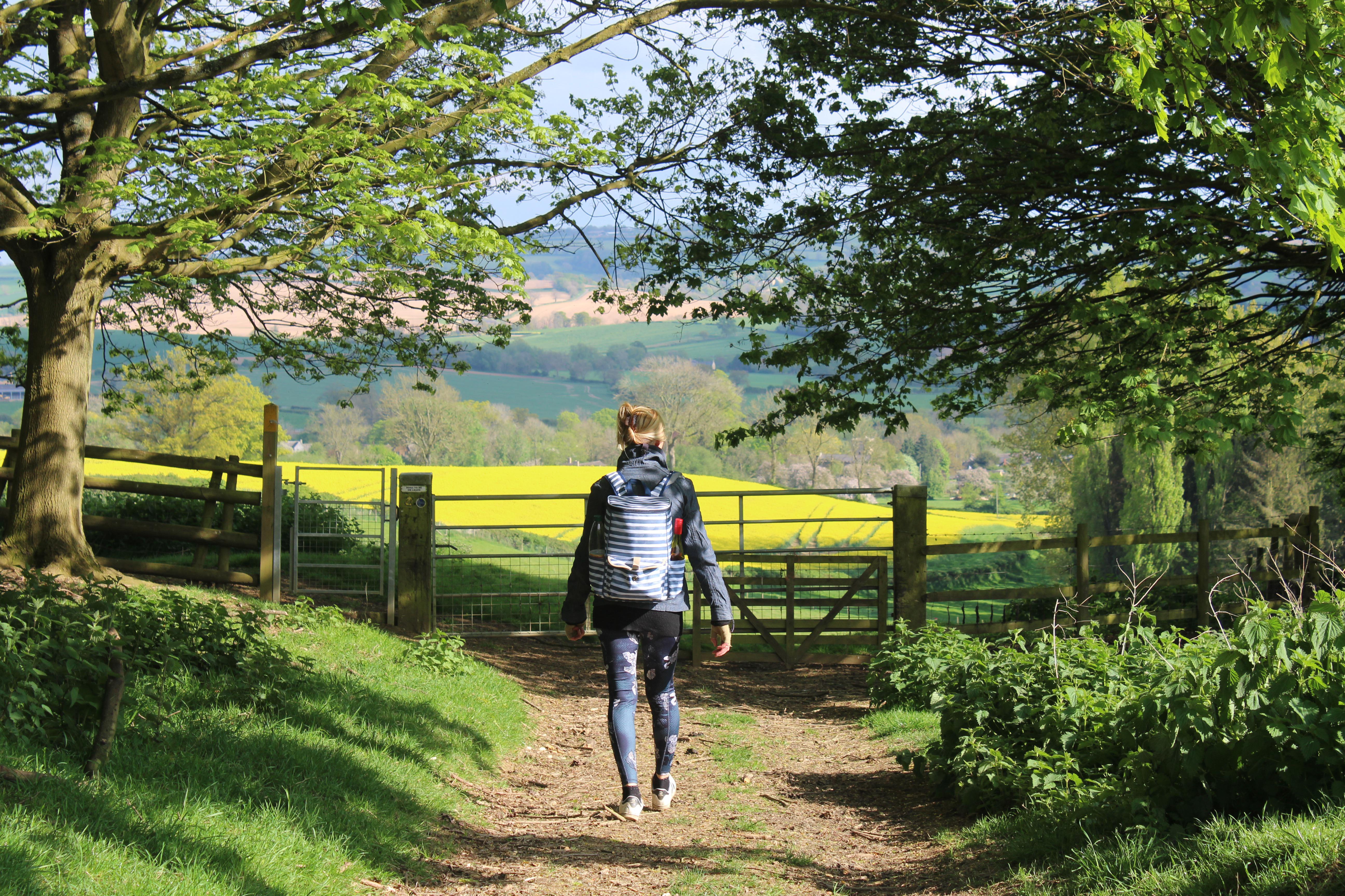 Person walking a footpath in the countryside 